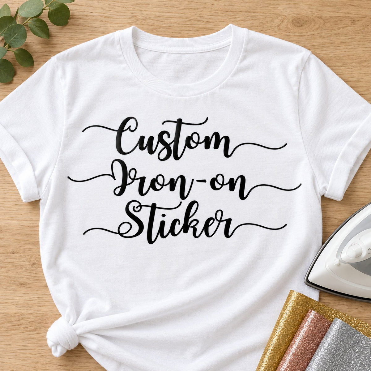 Custom iron-on name transfer - black script lettering heat-pressed on a white T-shirt