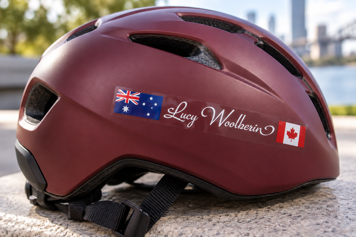 Two flag name sticker on a cycling helmet – printed on clear vinyl with a transparent perimeter