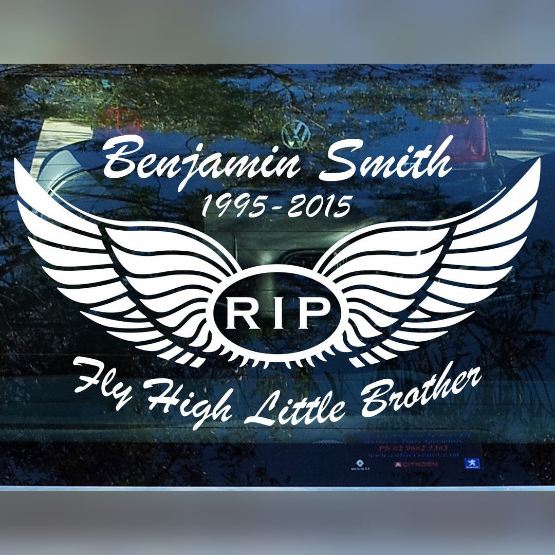 Memorial angel wings decal – white RIP wings with name, dates and message on a car rear window