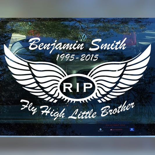 Memorial angel wings decal – white RIP wings with name, dates and message on a car rear window