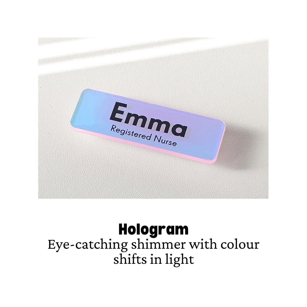 Custom acrylic name badge with a hologram finish showing colour-shifting shimmer, printed with a name and role