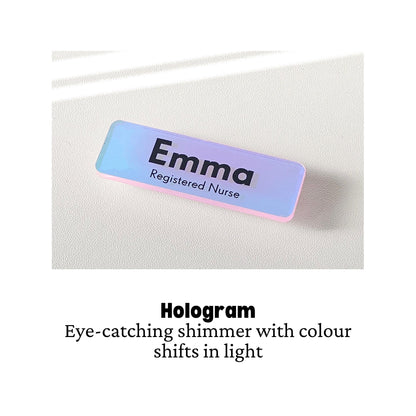 Custom acrylic name badge with a hologram finish showing colour-shifting shimmer, printed with a name and role