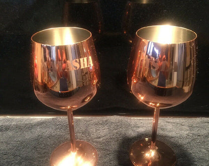 Pair of rose-gold stemmed goblets with a personalised name decal
