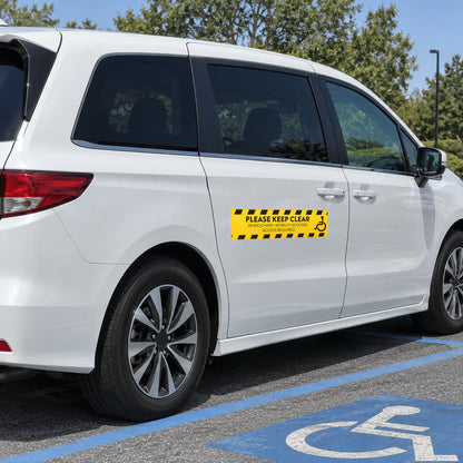Option 2 yellow wheelchair access decal with black hazard stripes and one wheelchair symbol, reading PLEASE KEEP CLEAR, WHEELCHAIR / MOBILITY SCOOTER ACCESS REQUIRED, on the sliding door of a white minivan.